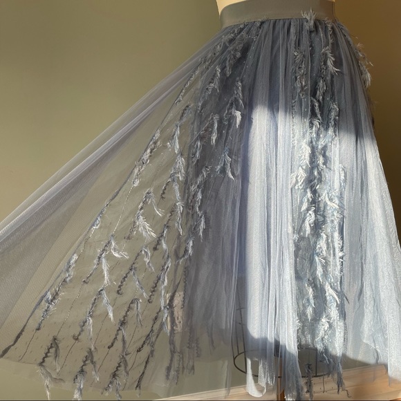 Light blue mesh skirt with fringes - Picture 2 of 3